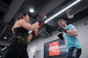 Two students on a Personal tainer course learning Padwork as part of their CPD module within the ADPT course