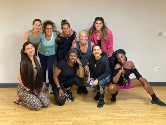 Group of women who just completed thier PT qualification. YMCAfit Tutor, Trish, is in the middle