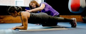 A tutor and student on a core stability CPD course for YMCAfit