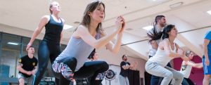 Students taking part in a High Intensity Interval Training in a fitness studio at YMCA Club