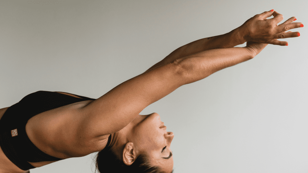 a woman stretching to aid recovery
