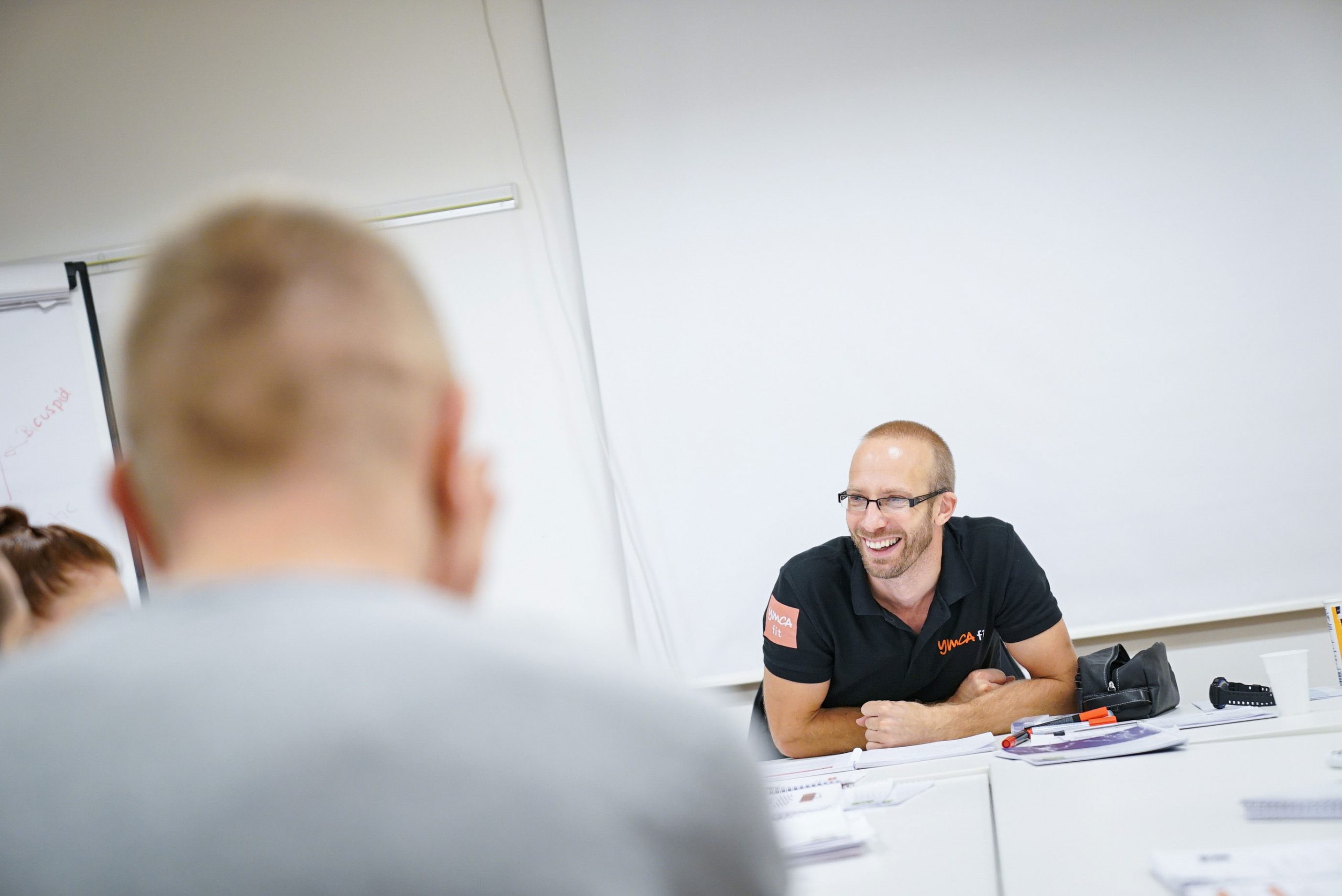 Instructor engaging with students in class